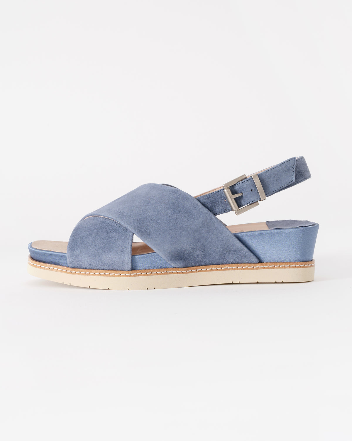 Blue sandal with a buckle on a white background