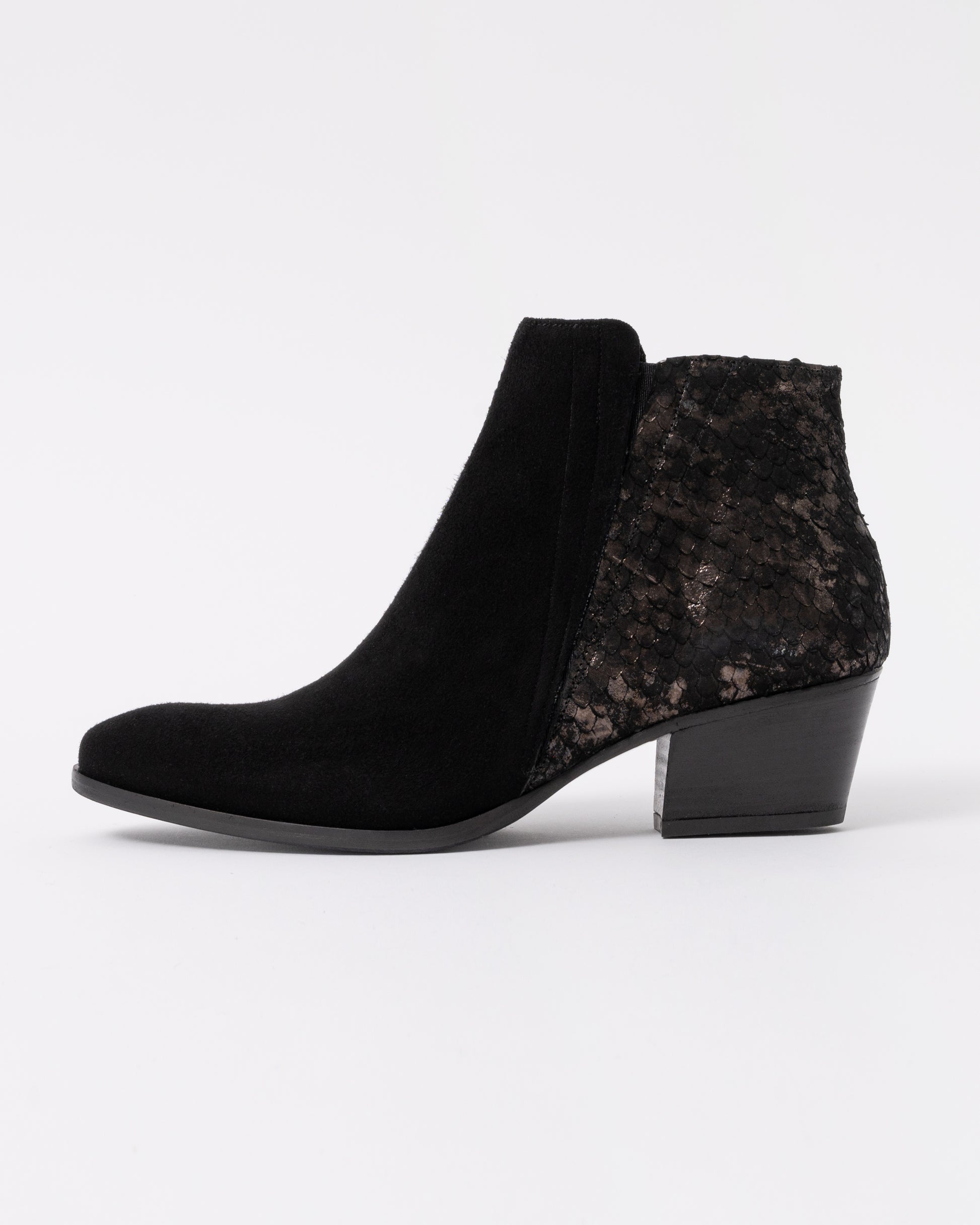 Black ankle boots with a textured pattern on a white background