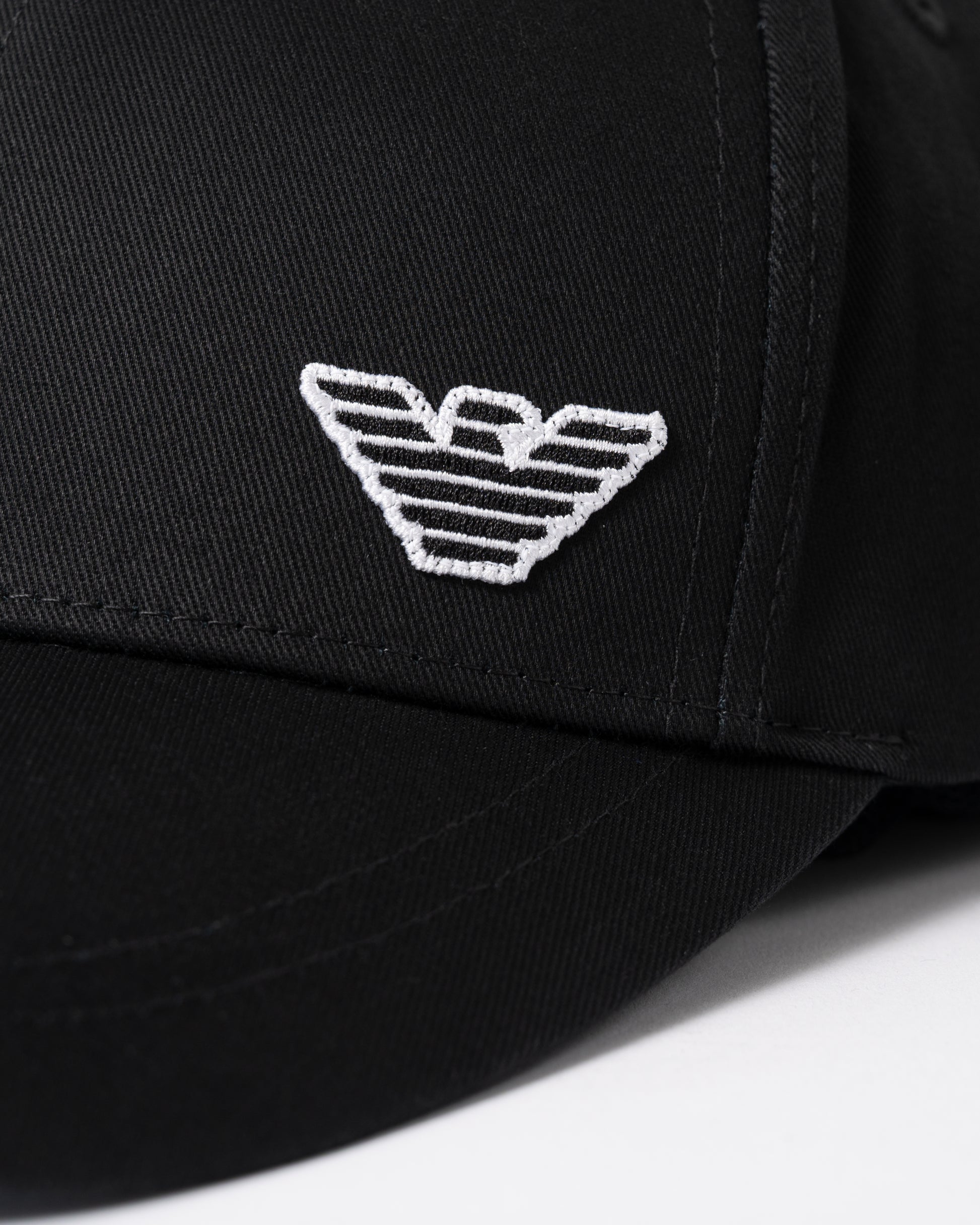 logo detail of Emporio Armani Mens Cap with Eagle Logo in Black