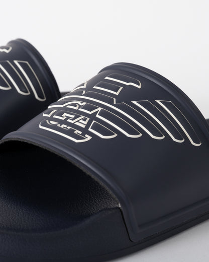 logo detail of Emporio Armani Mens PVC Pool Slides with Eagle Logo in Blue and Whisper White