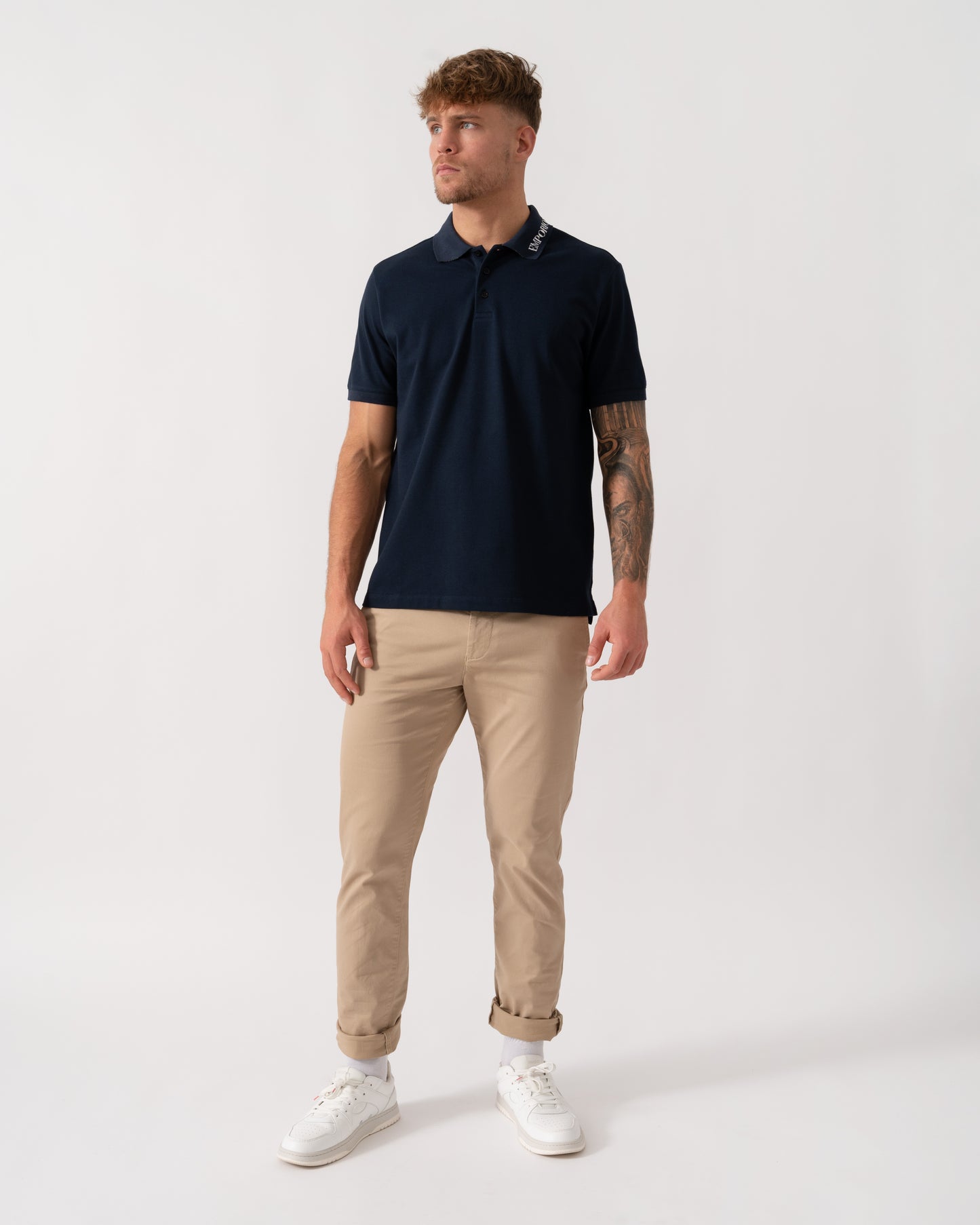 Model wearing Emporio Armani Mens Beach Polo in Armani Blue - Full Length