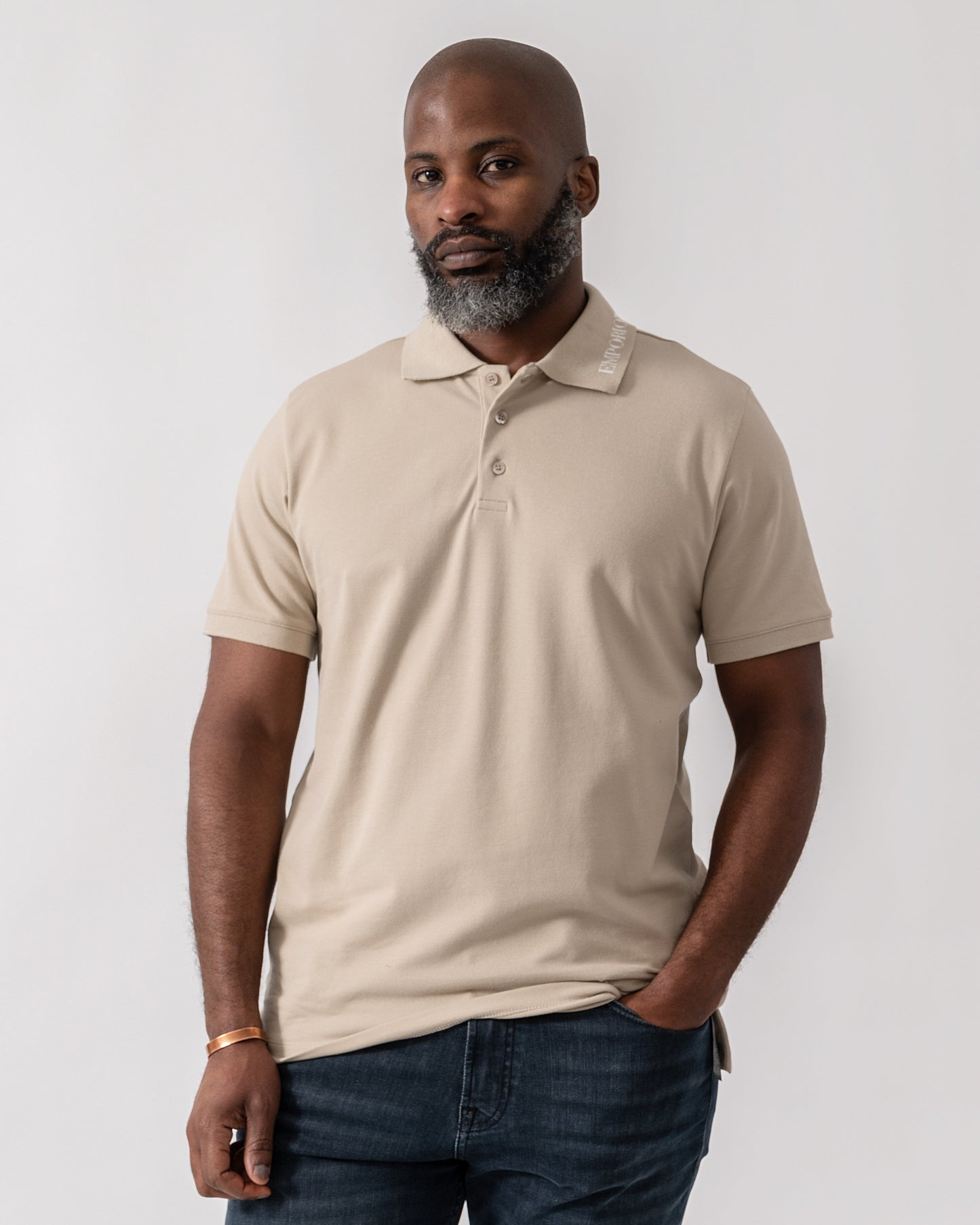 Model wearing Emporio Armani Mens Beach Polo in Taupe - Main