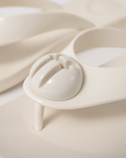 detail of FitFlop Womens IQUSHION Glossy-Button Flip-Flops in Cream 477