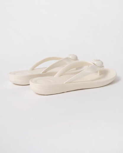 back of FitFlop Womens IQUSHION Glossy-Button Flip-Flops in Cream 477
