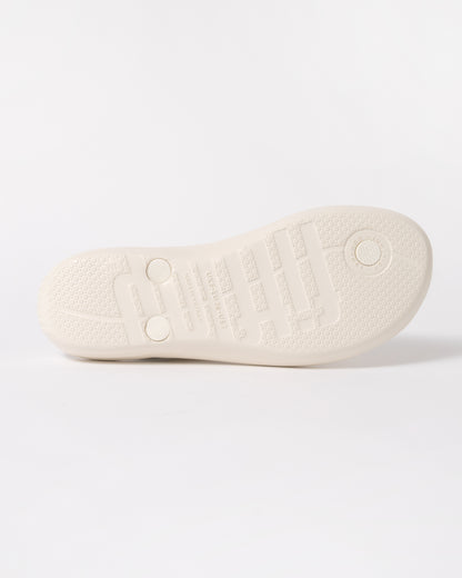 sole of FitFlop Womens IQUSHION Glossy-Button Flip-Flops in Cream 477