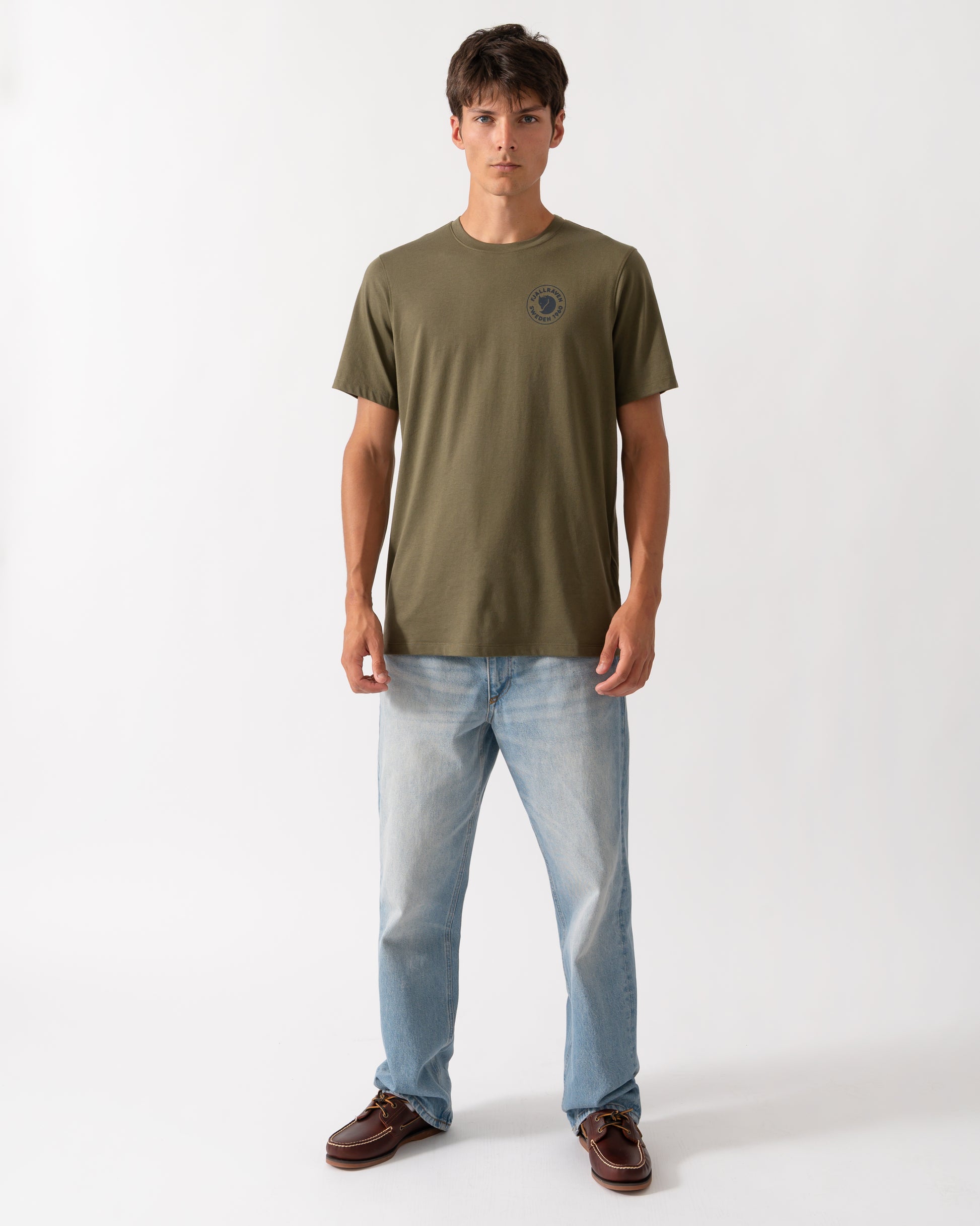 full length of a model wearing a Fjallraven 1960 Logo Mens T-Shirt in Laurel Green 625