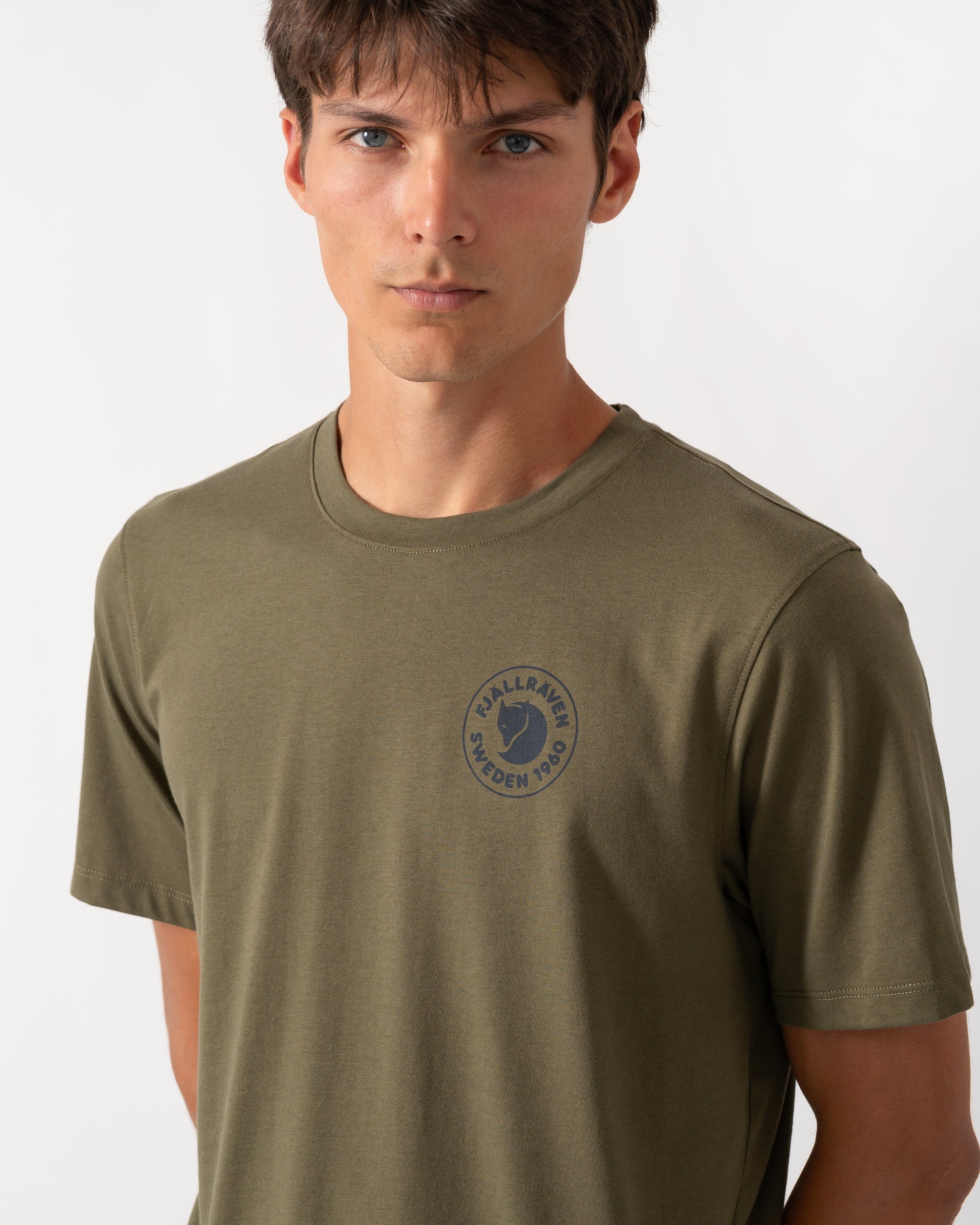 close up of a model wearing a Fjallraven 1960 Logo Mens T-Shirt in Laurel Green 625
