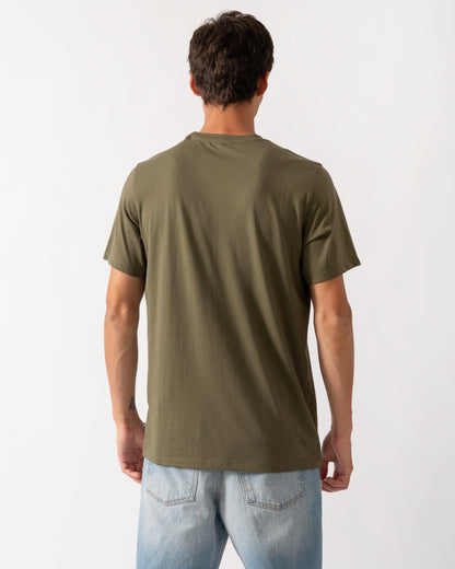 back of a model wearing a Fjallraven 1960 Logo Mens T-Shirt in Laurel Green 625