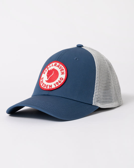 side of Fjallraven 1960 Logo Unisex Langtradarkeps cap in Indigo Blue 534
