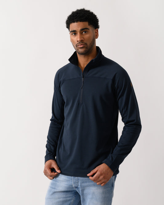 model wearing a Fjallraven Abisko Lite Fleece Half Zip Mens Sweatshirt in Dark Navy 555
