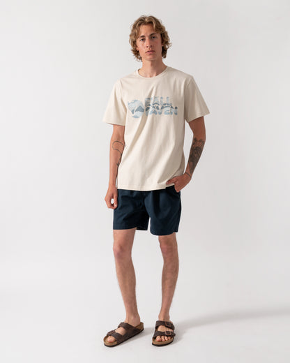 full length shot of a model wearing a Fjallraven Multicolor Logo Mens T-Shirt in Chalk White 113