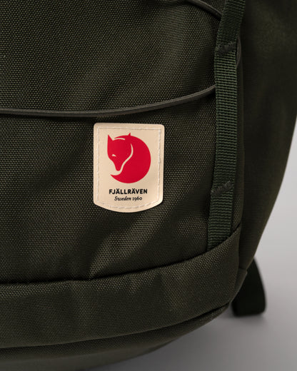 logo detail of of Fjallraven Skule 24L Unisex Backpack in Deep Forest 662