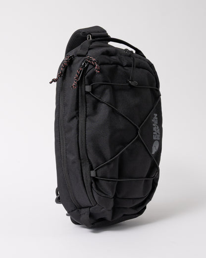 front of a Fjallraven Skule 6L Unisex Sling Bag in Black 550