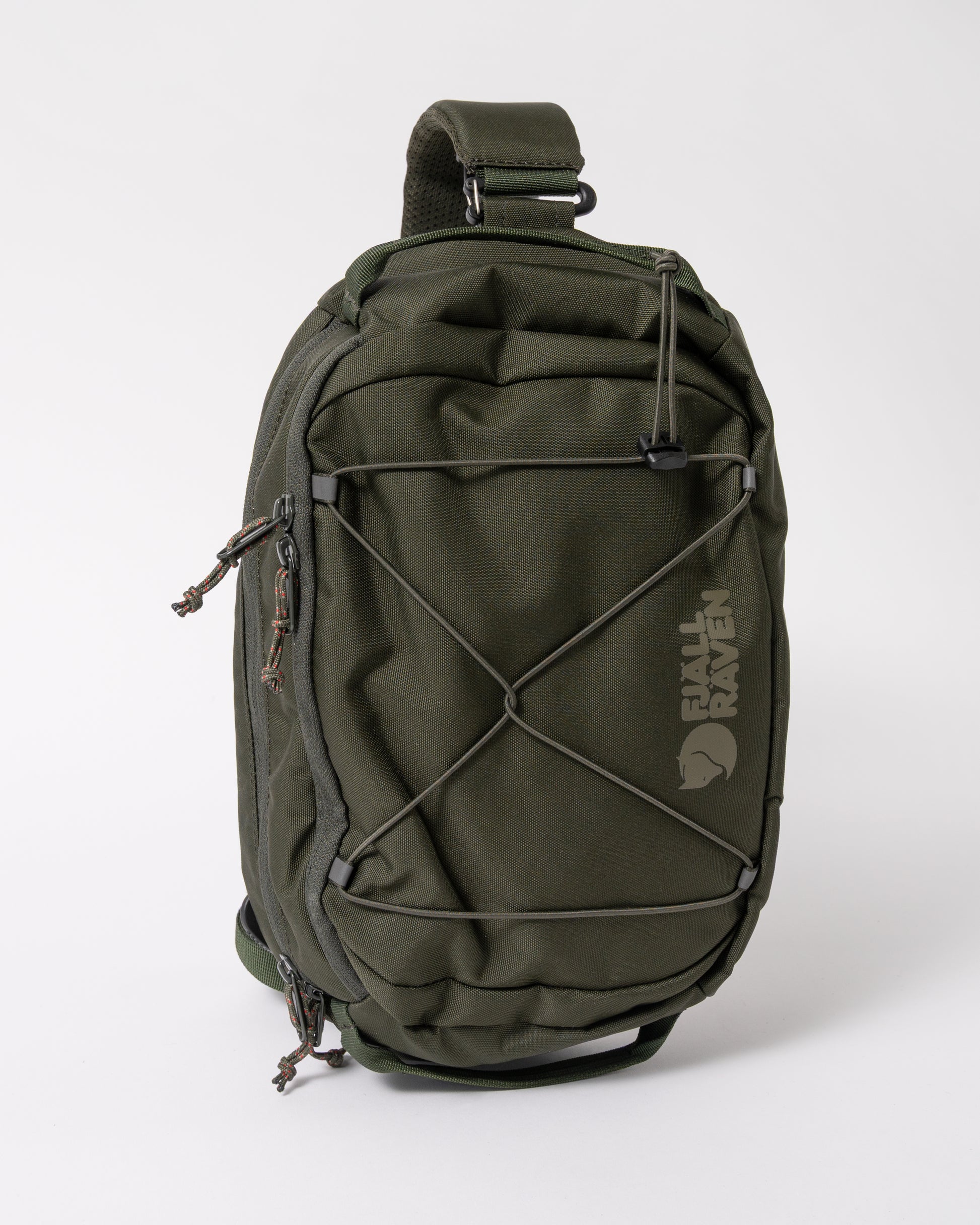 front of a Fjallraven Skule 6L Unisex Sling Bag a Deep Forest 662