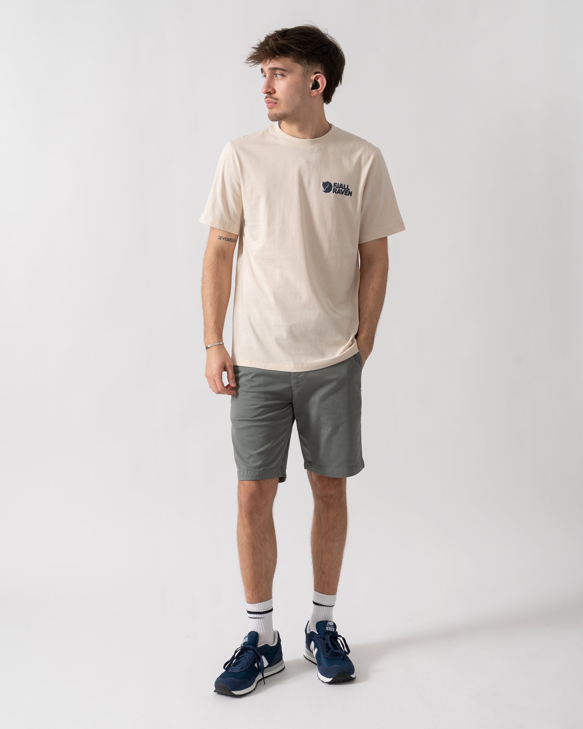 full length shot of a model wearing a Fjallraven Swedish Forest Mens T-Shirt in Chalk White 113