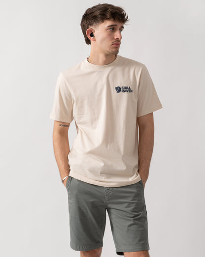 studio shot of a model wearing a Fjallraven Swedish Forest Mens T-Shirt in Chalk White 113