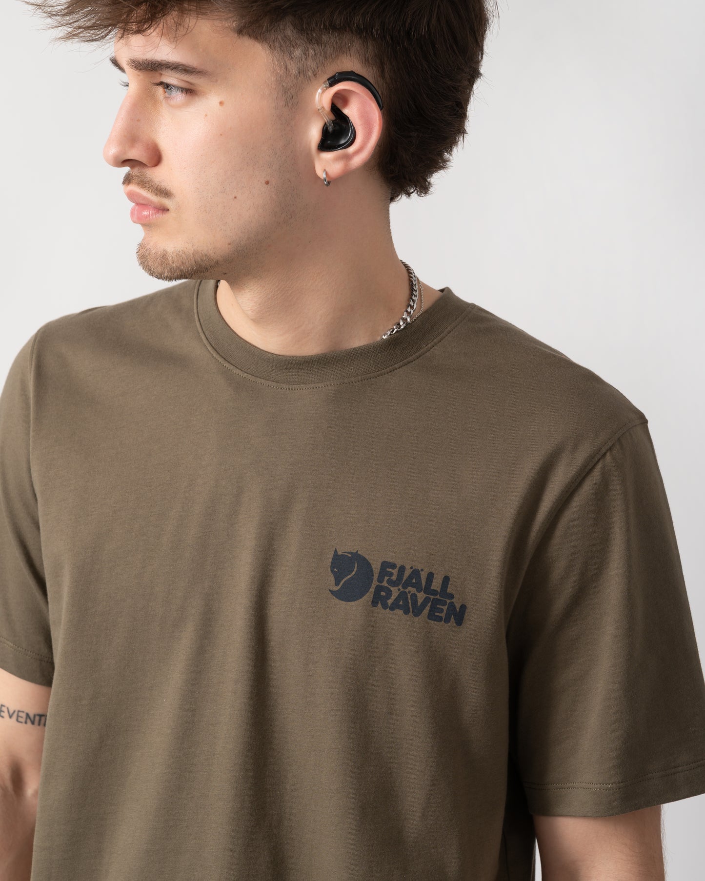 close up shot of a model wearing a Fjallraven Swedish Forest Mens T-Shirt in Laurel Green 625