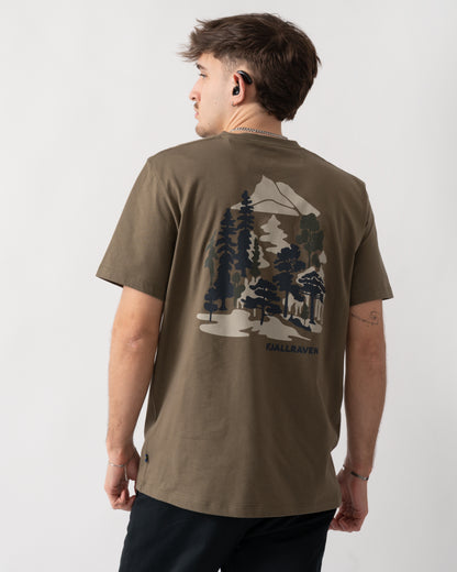 back shot of a model wearing a Fjallraven Swedish Forest Mens T-Shirt in Laurel Green 625