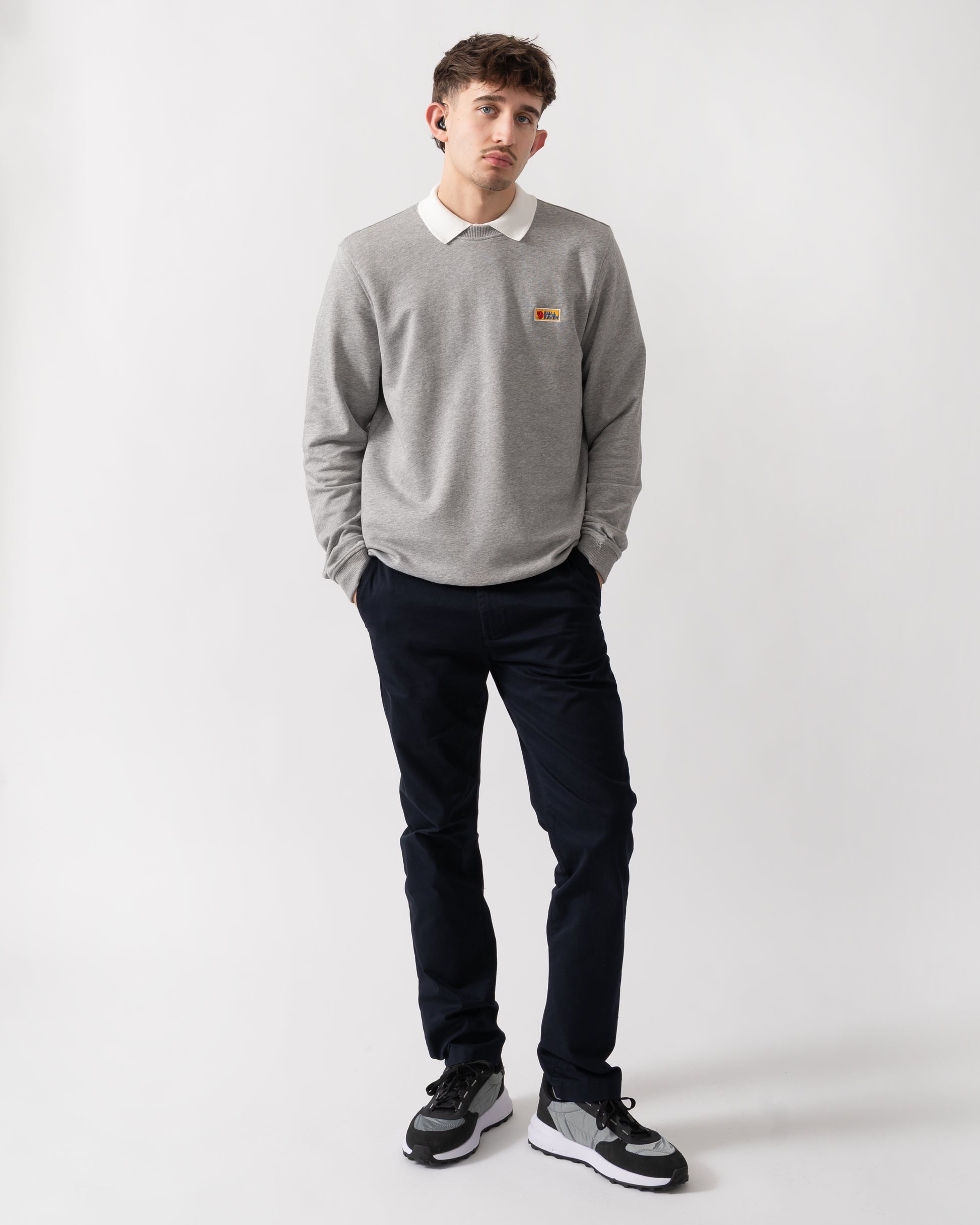full length shot of a model wearing a Fjallraven Vardag Mens Sweater in Grey Melange 020-999