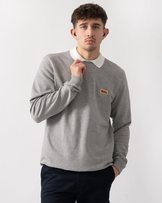 studio shot of a model wearing a Fjallraven Vardag Mens Sweater in Grey Melange 020-999