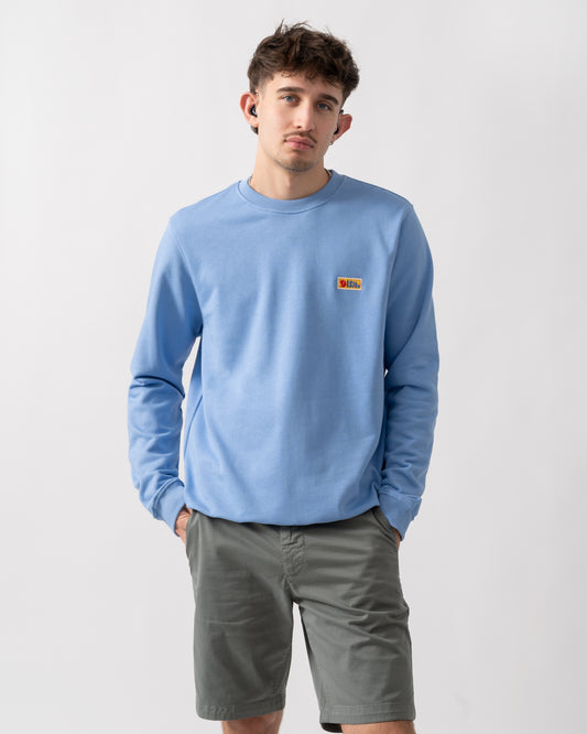 studio shot of a model wearing a Fjallraven Vardag Mens Sweater in Ultramarine 537