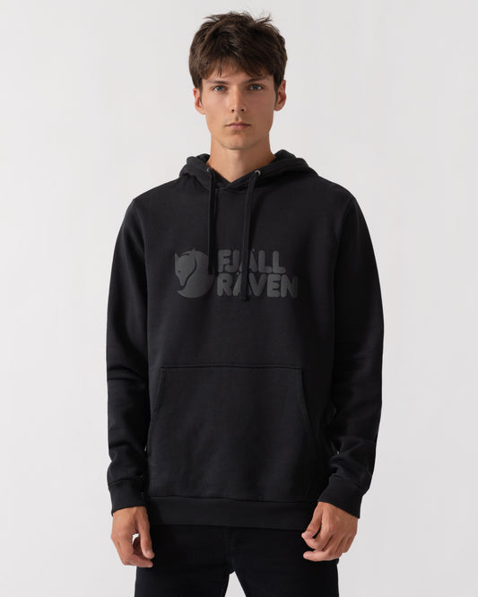 model wearing Fjallraven Logo Mens Hoodie in Black 550