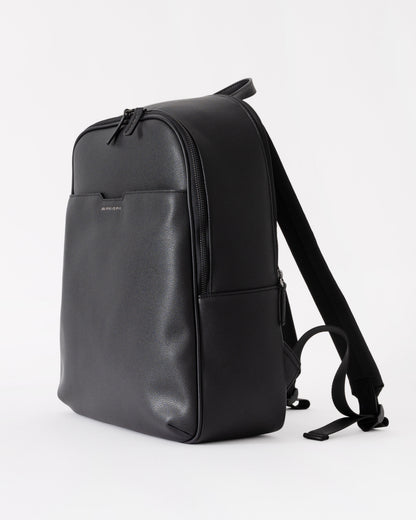 Black backpack on a white background