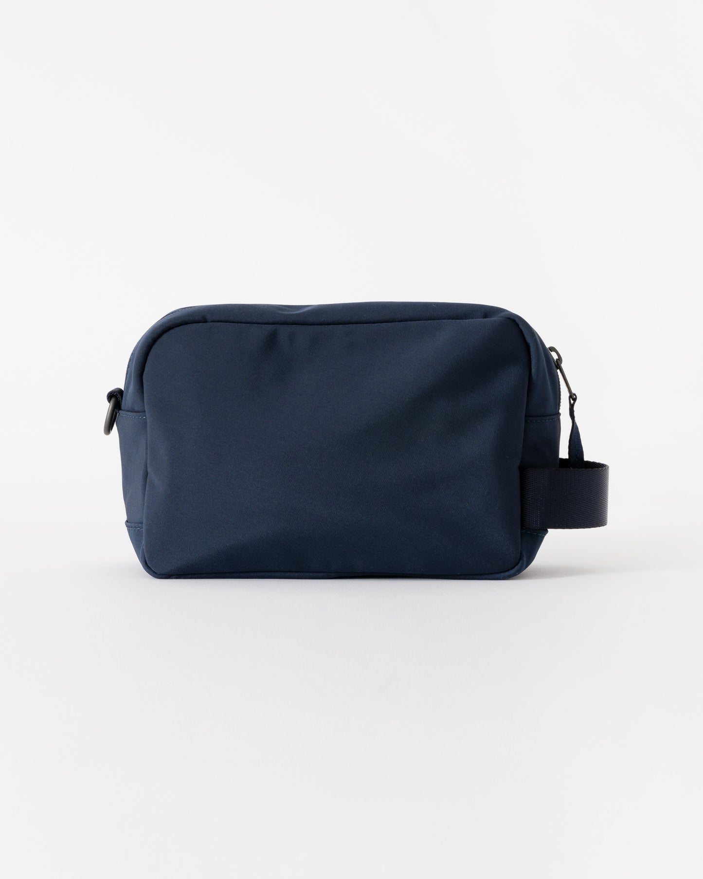 Navy blue toiletry bag on a white background