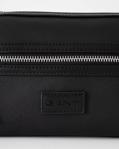 Black Gant bag with a visible brand logo on a white background