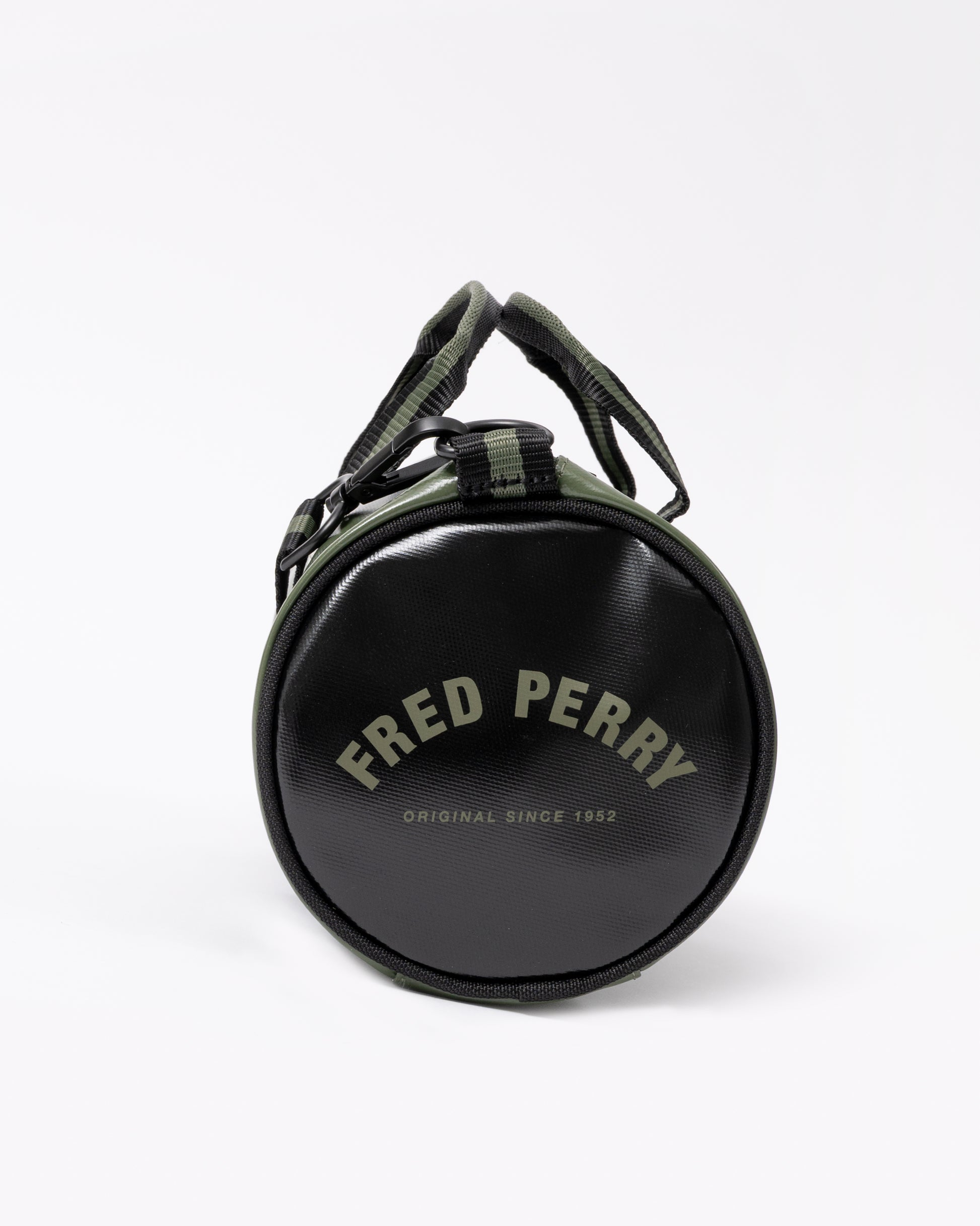 end view of a Fred Perry Classic Mini Barrel Bag in Laurel Wreath Green and Black Z50