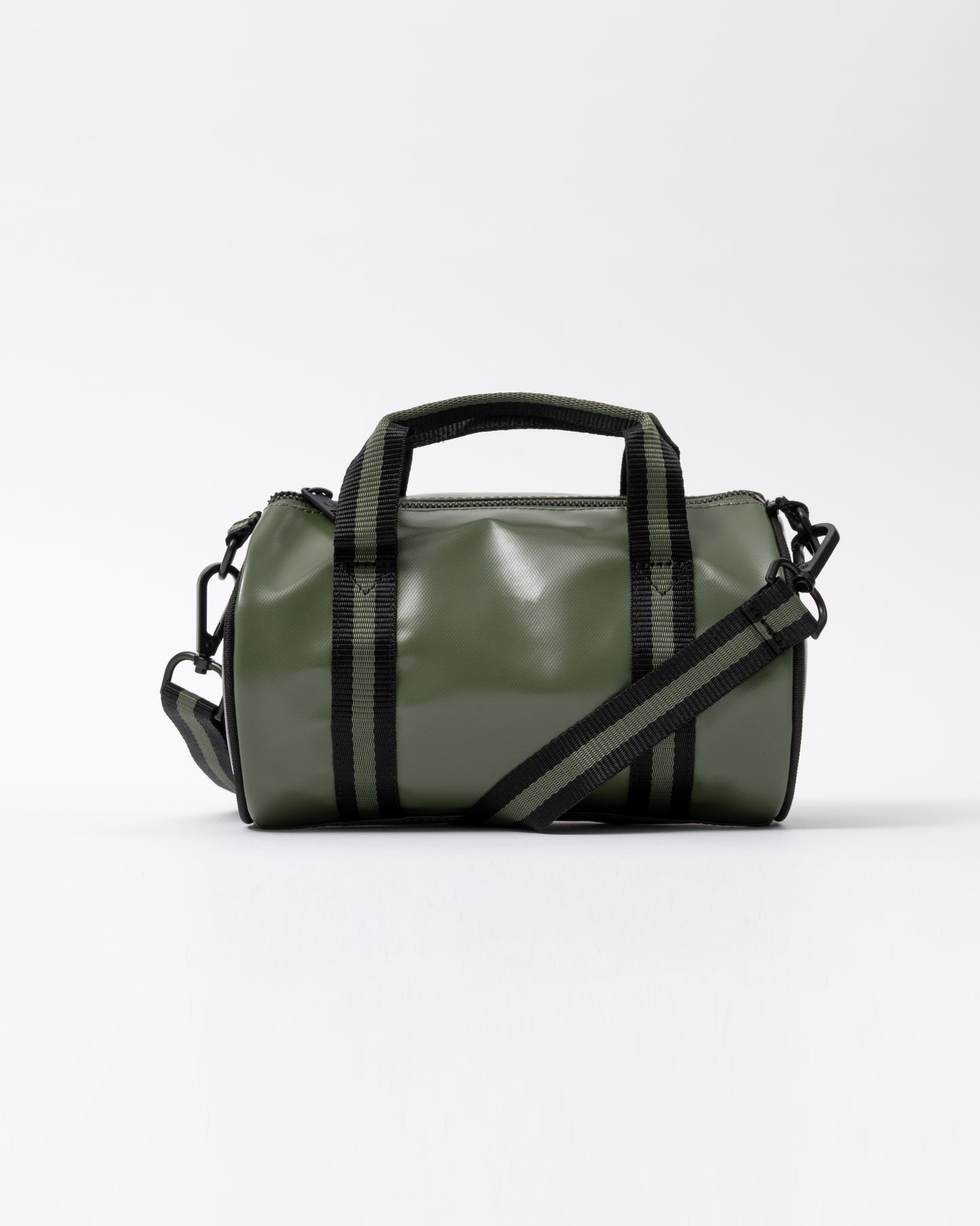 side of a Fred Perry Classic Mini Barrel Bag in Laurel Wreath Green and Black Z50