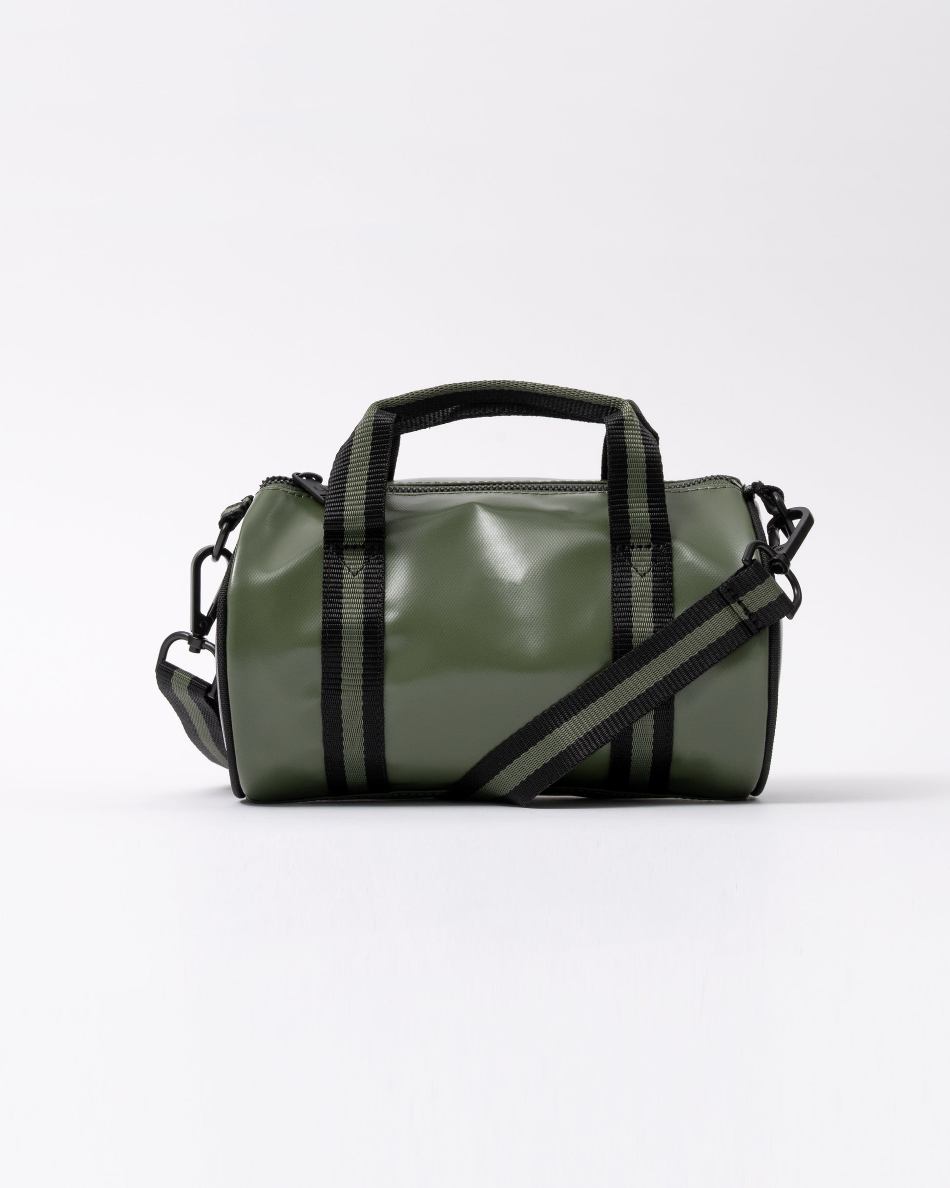 side of a Fred Perry Classic Mini Barrel Bag in Laurel Wreath Green and Black Z50