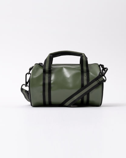 side of a Fred Perry Classic Mini Barrel Bag in Laurel Wreath Green and Black Z50