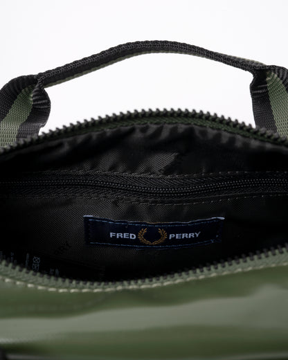 interior detail of a Fred Perry Classic Mini Barrel Bag in Laurel Wreath Green and Black Z50