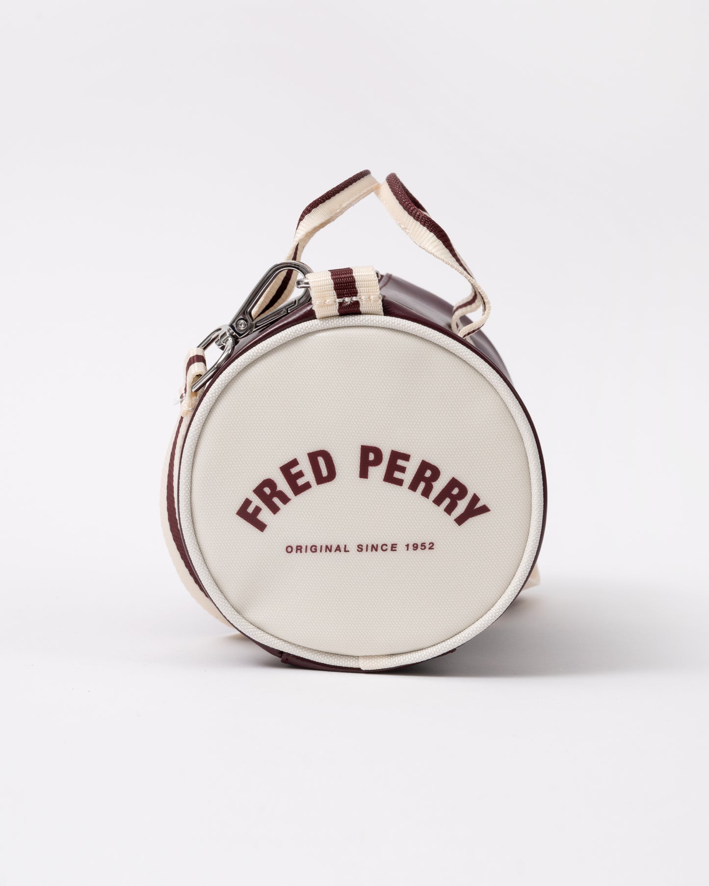 end view of a Fred Perry Classic Mini Barrel Bag in Oxblood and Ecru