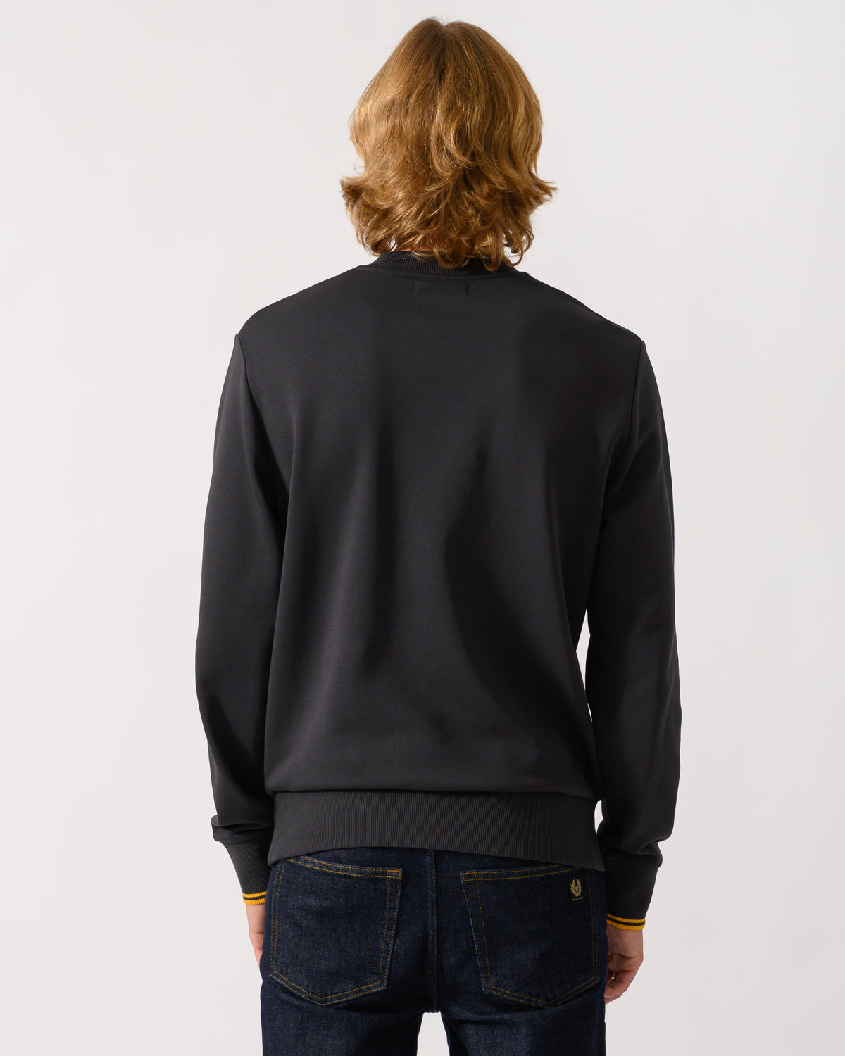 studio photograph showing back of a model wearing a Fred Perry Mens Crew Neck Sweatshirt in Anchor Grey/Golden 85C