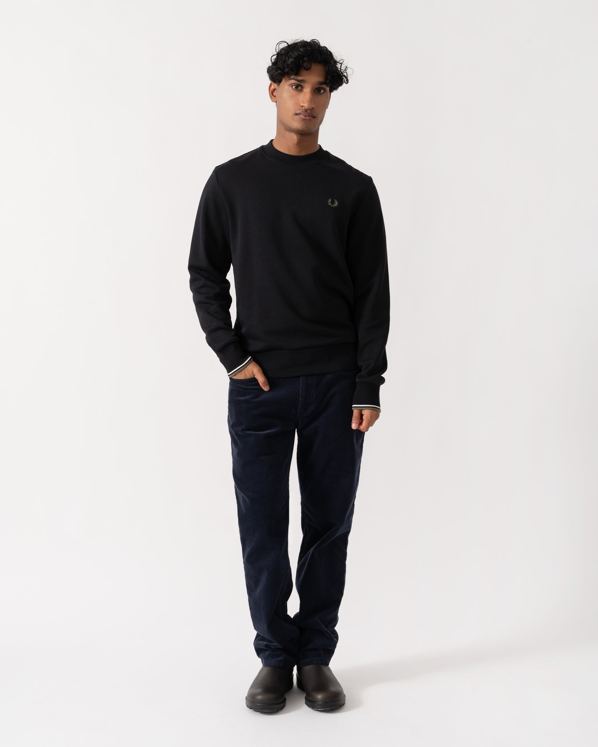 Man wearing Fred Perry Mens Crew Neck Sweatshirt - Black/Ecru/Laurel Wreath Green W54