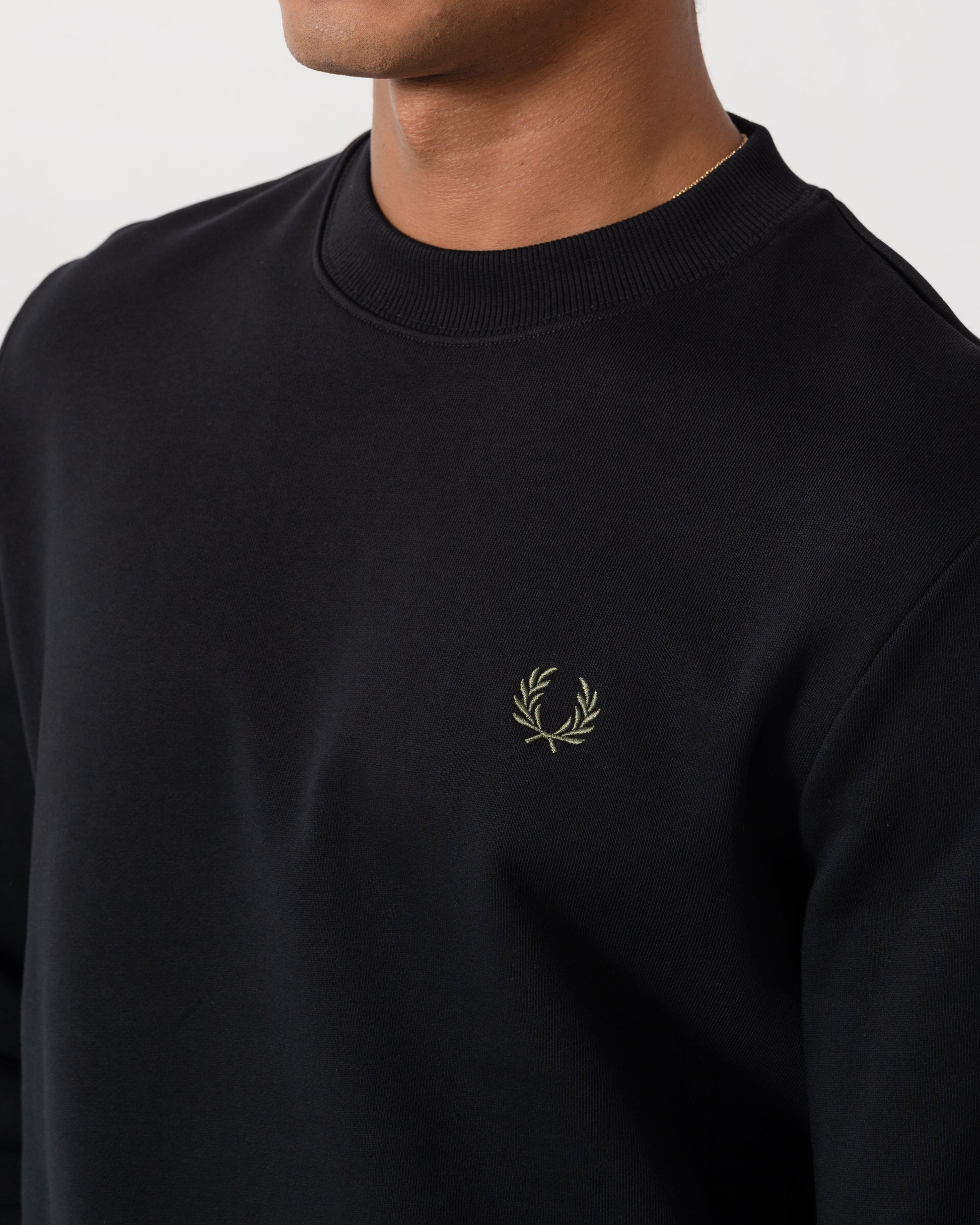Close up of Fred Perry Mens Crew Neck Sweatshirt - Black/Ecru/Laurel Wreath Green W54