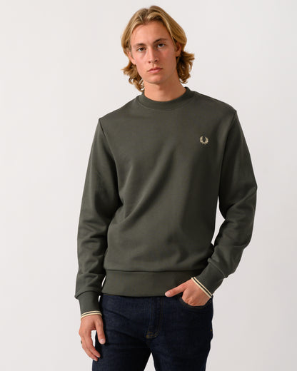 studio photograph of a model wearing Fred Perry Mens Crew Neck Sweatshirt in Field Green/Oatmeal U98
