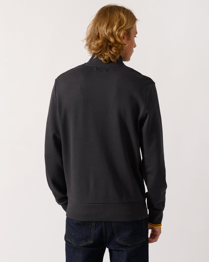 studio photograph showing back of a model wearing a Fred Perry Mens Half Zip Sweatshirt in Anchor Grey/Golden 85C