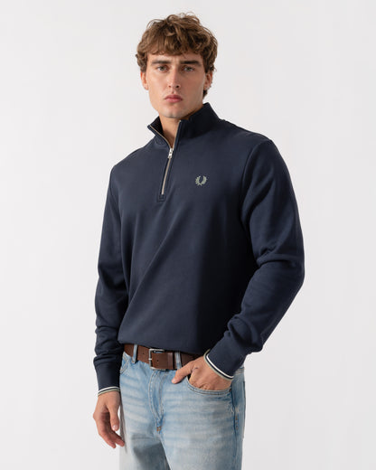 Model wearing Fred Perry Mens Half Zip Sweatshirt - Dark Airforce/Ecru/Seagrass 72C