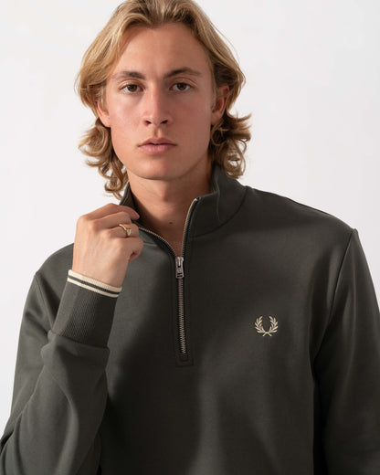 Close up of the Fred Perry Mens Half Zip Sweatshirt - Field Green/Oatmeal U98