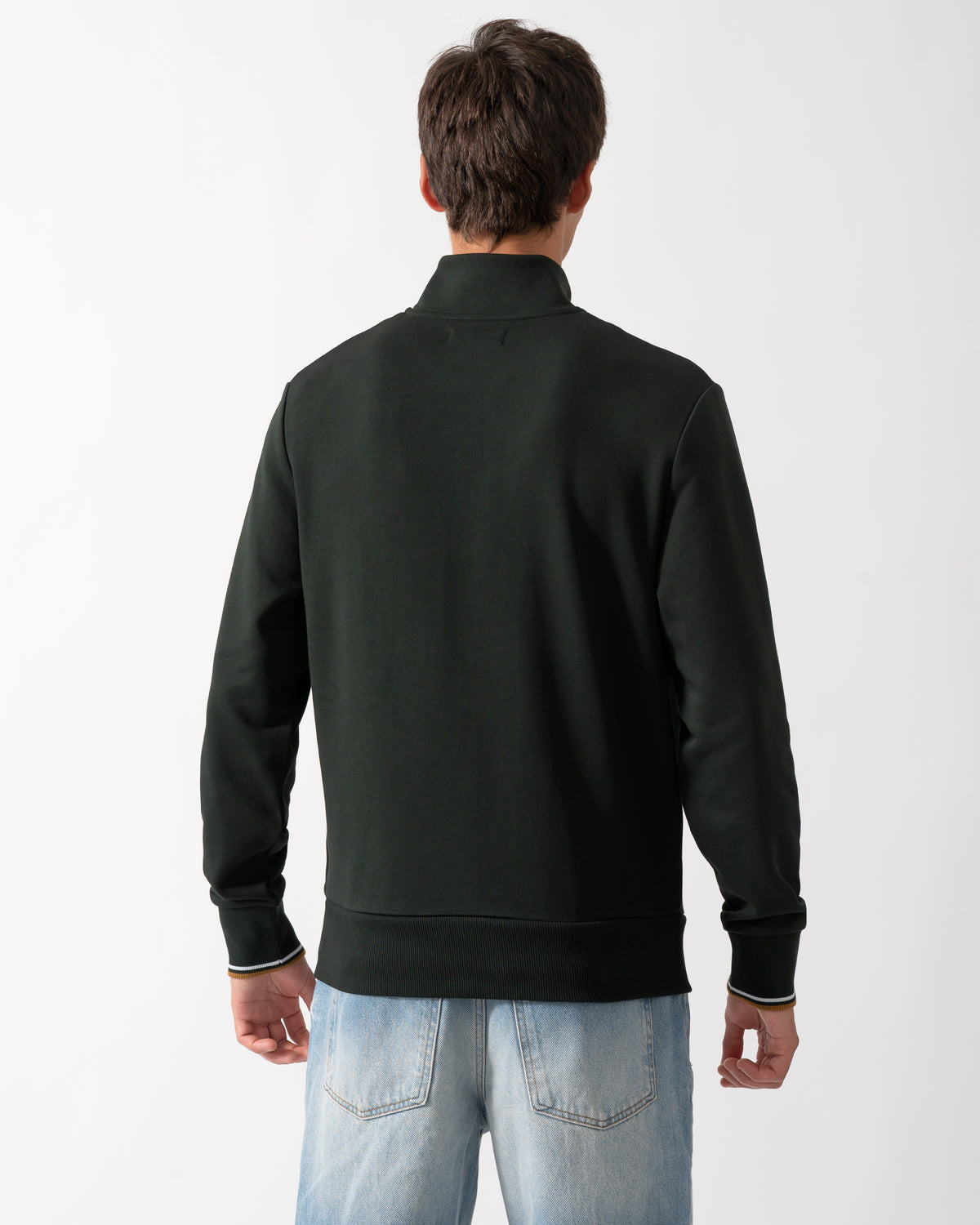 back of a model wearing a Fred Perry Mens Half Zip Sweatshirt in Night Green, with Dusk Blue and Dark Caramel trim