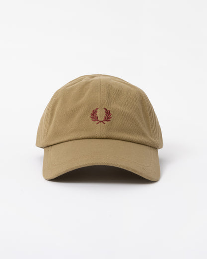 Front of the Fred Perry Mens Pique Classic Cap - Bronze/Oxblood 62D