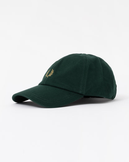 Side of the Fred Perry Mens Pique Classic Cap - Grassroots/Bronze 86D