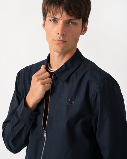 close up of a model wearing a Fred Perry Mens Poplin Zip Overshirt in Navy 608