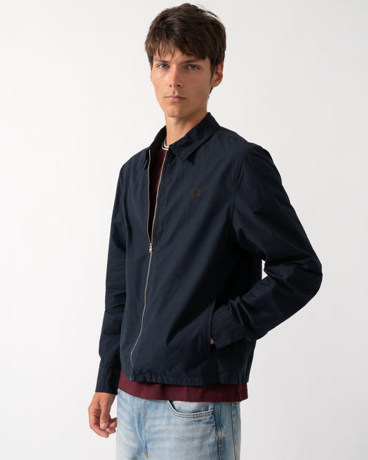 model wearing a Fred Perry Mens Poplin Zip Overshirt in Navy 608