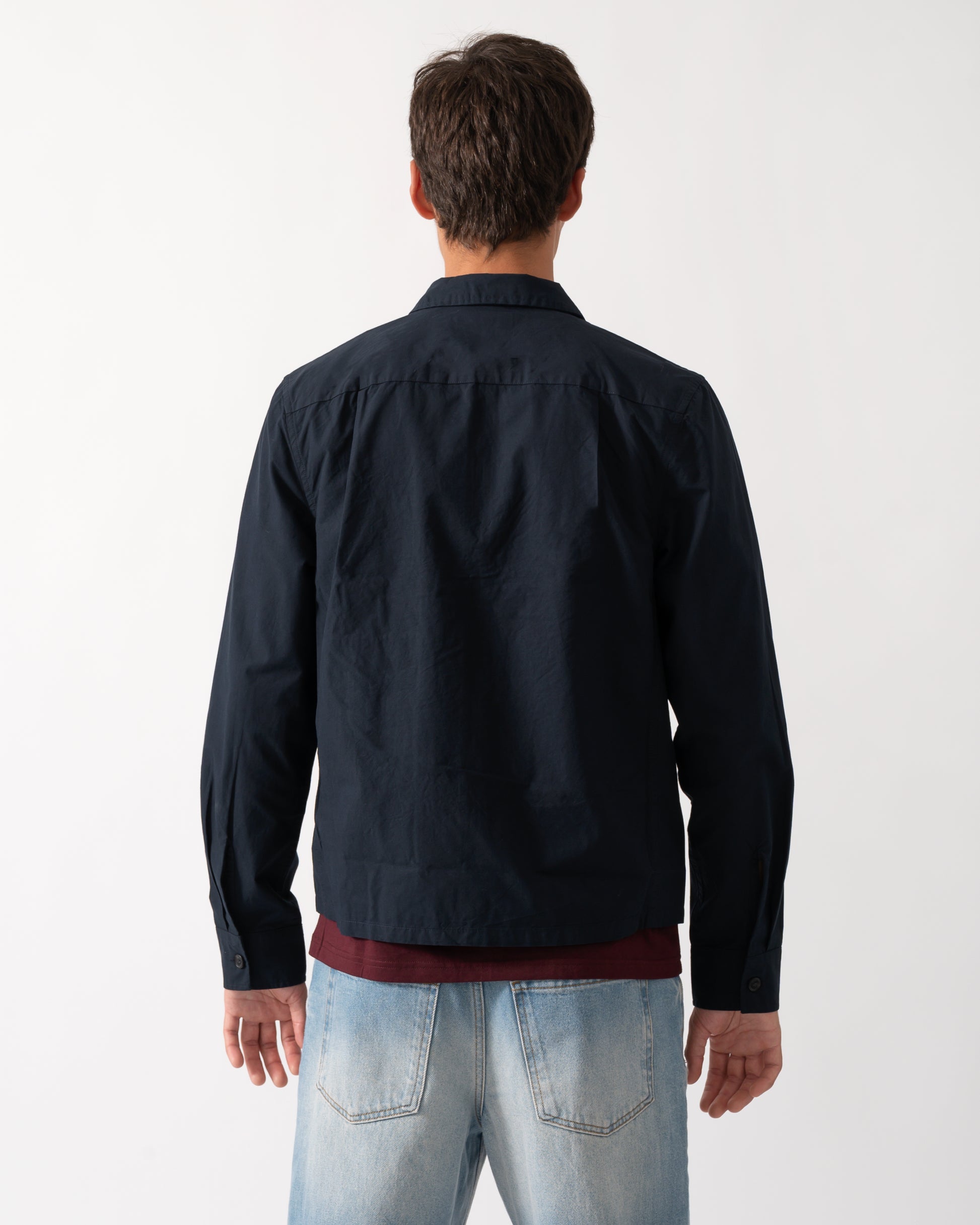 back of a model wearing a Fred Perry Mens Poplin Zip Overshirt in Navy 608
