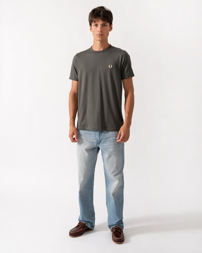 full length of a model wearing model wearing a Fred Perry Mens Ringer T-Shirt in Field Green 148