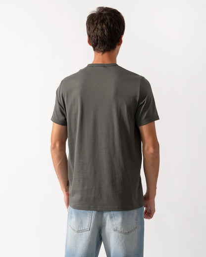 back of model wearing a Fred Perry Mens Ringer T-Shirt in Field Green 148